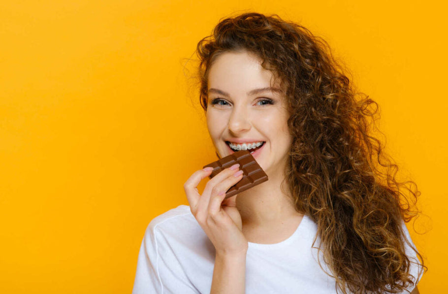 Poți mânca ciocolată cu aparat dentar? Ce trebuie să știi